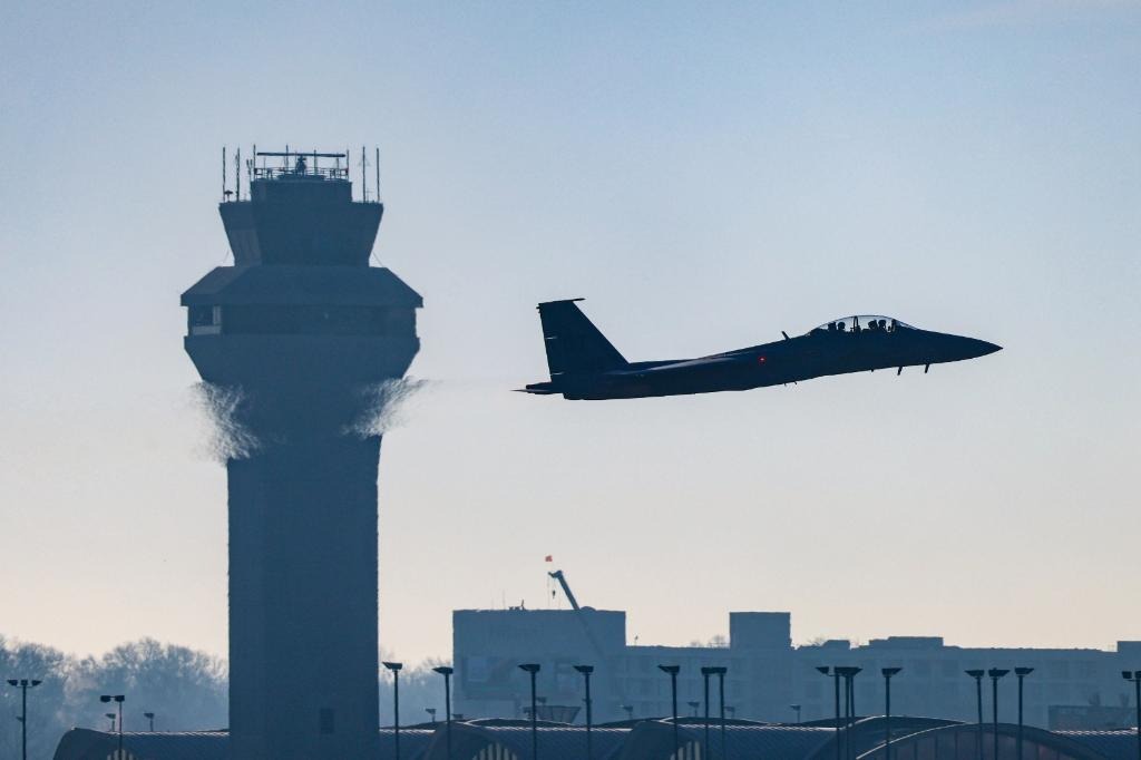 F-15 flying past the control tower at St. Louis Lambert International Airport
